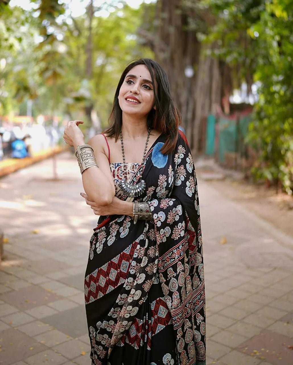 BLACK COLOR AJRAKH SAREE WITH SMALL BINDI PALLU