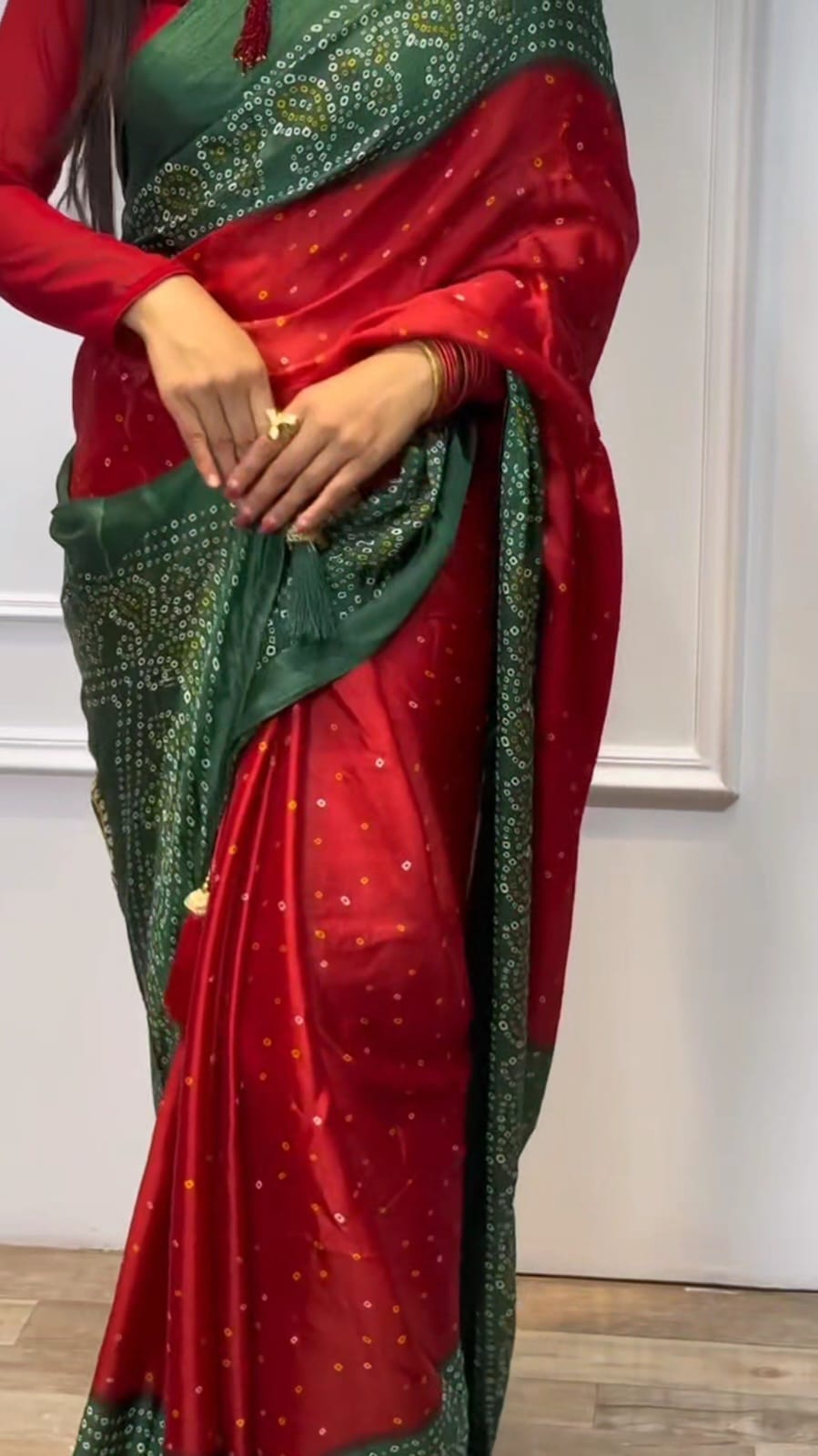 RED AND GREEN BANDHNI SAREE.