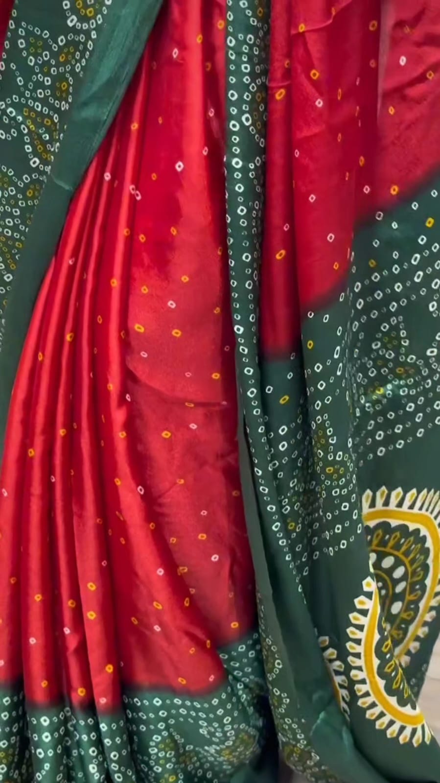 RED AND GREEN BANDHNI SAREE.