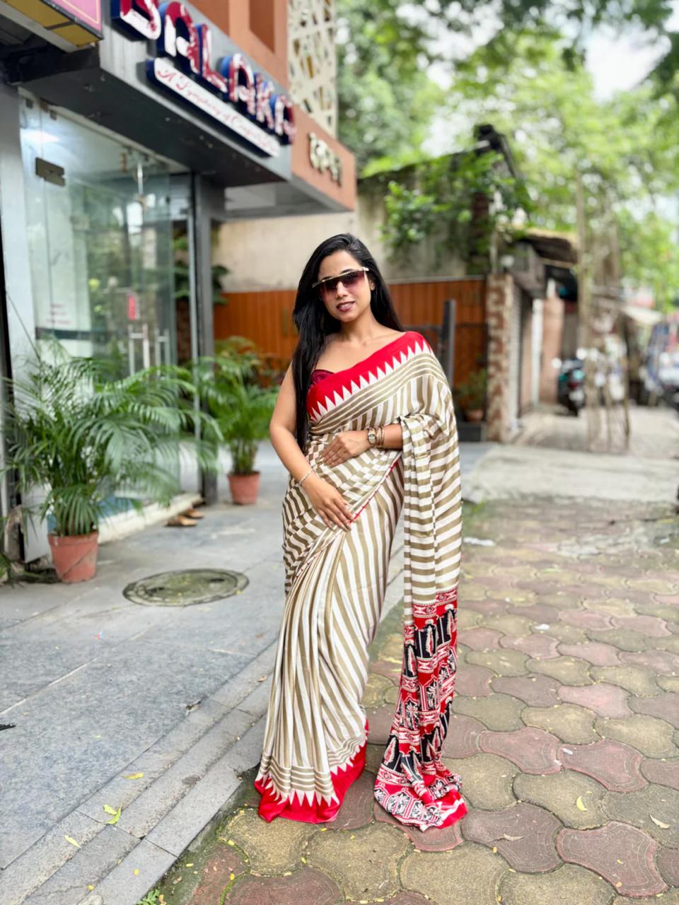 EXCLUSIVE RED AJRAKH PALLU LAHERIYA SAREE