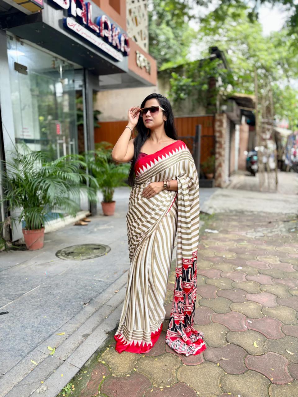 EXCLUSIVE RED AJRAKH PALLU LAHERIYA SAREE