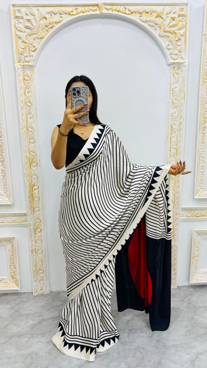 CREAM COLOR LAHERIYA SAREE WITH RED BINDI SAREE