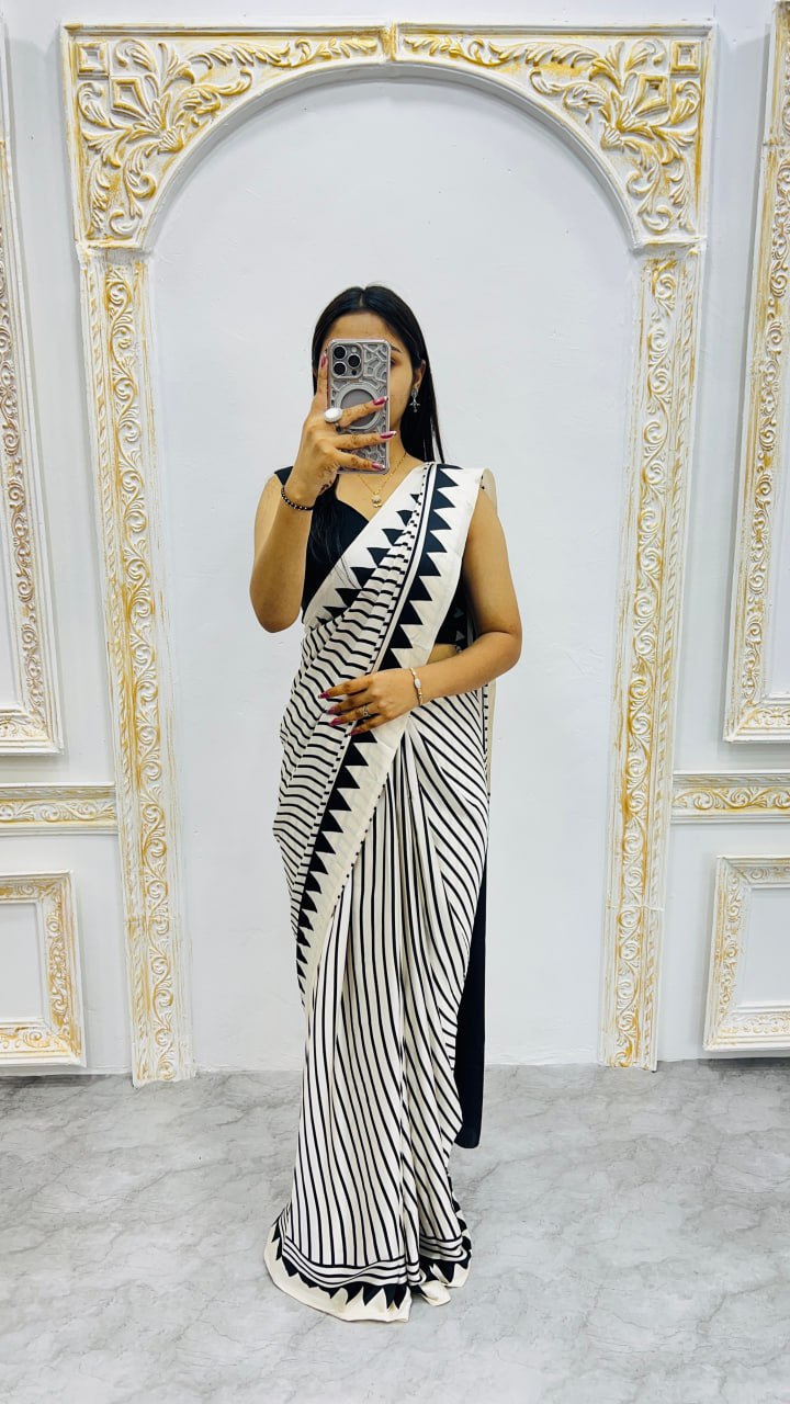 CREAM COLOR LAHERIYA SAREE WITH RED BINDI SAREE