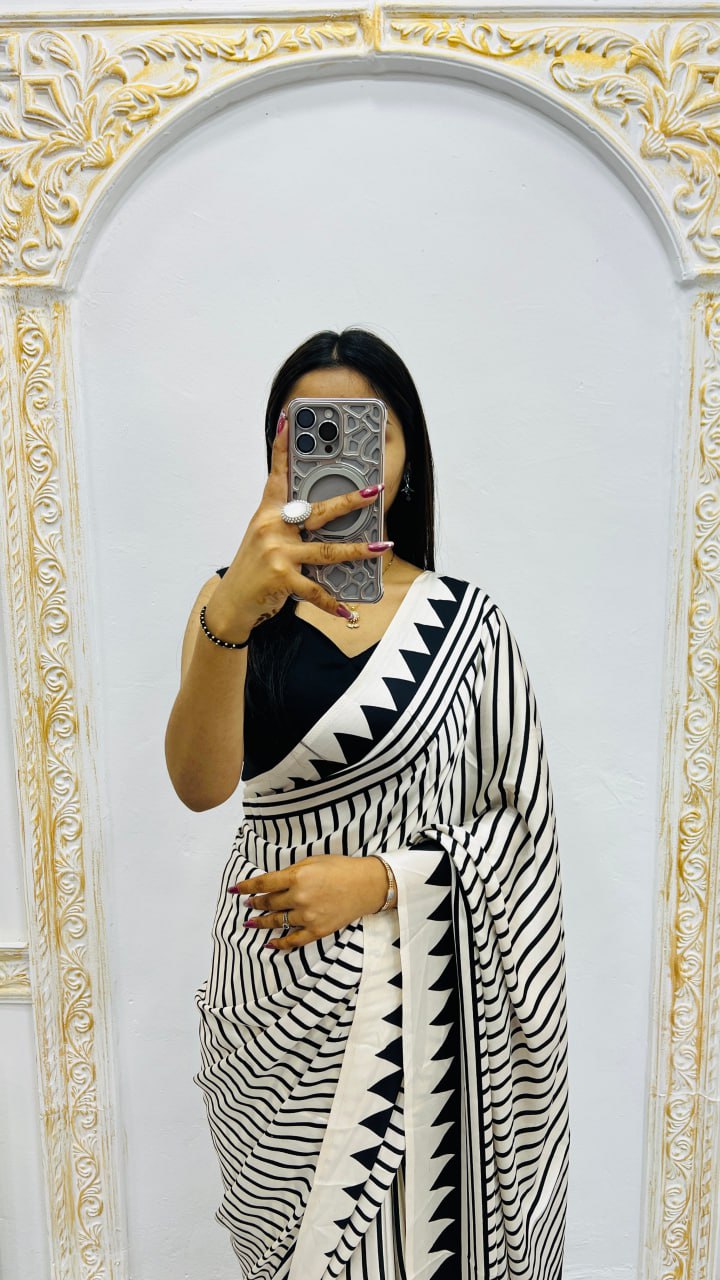 CREAM COLOR LAHERIYA SAREE WITH RED BINDI SAREE